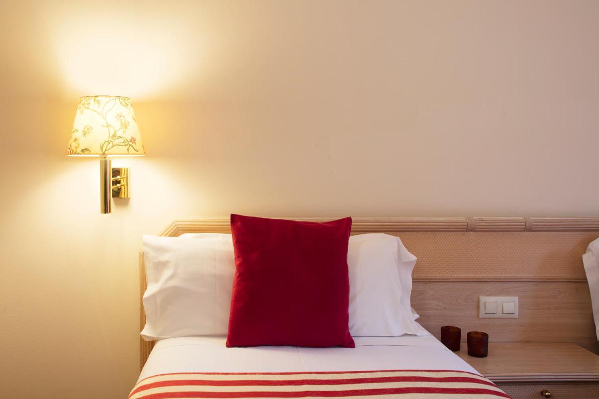Cama o camas de una habitación en Luna Club Hotel Yoga & Spa 4Sup