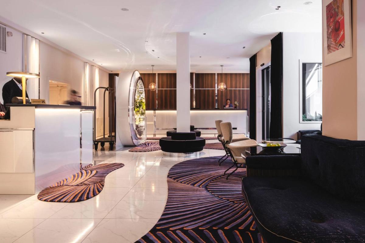 Coin salon dans l'établissement Hôtel Bel Ami