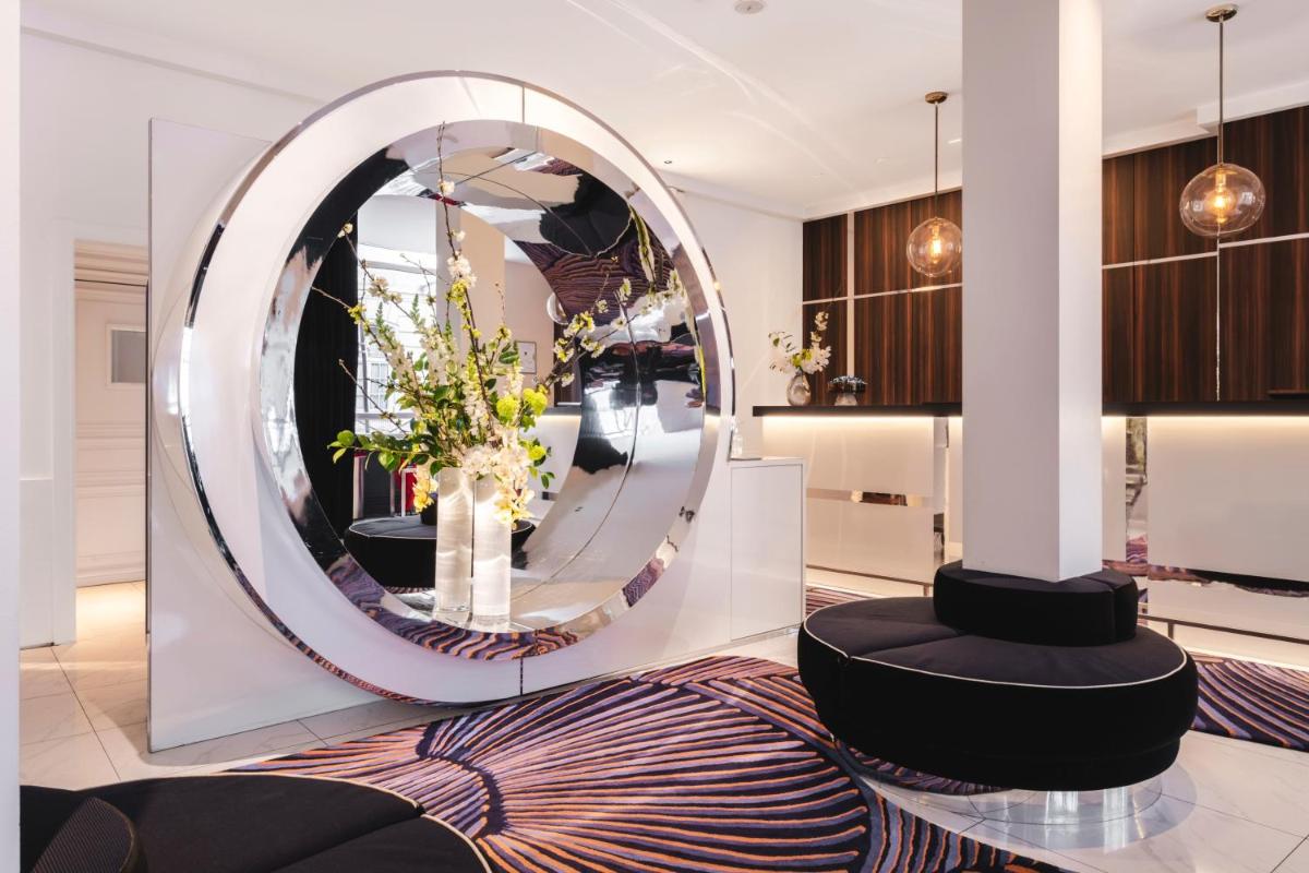 Coin salon dans l'établissement Hôtel Bel Ami