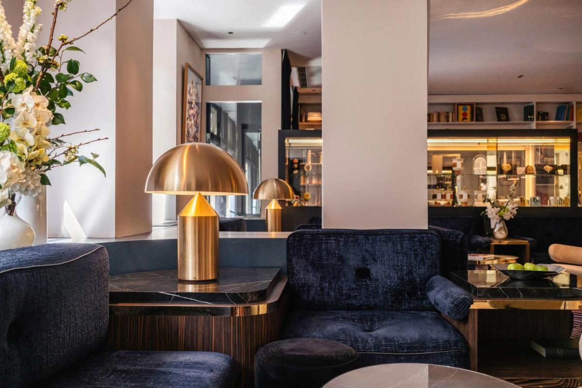 Coin salon dans l'établissement Hôtel Bel Ami