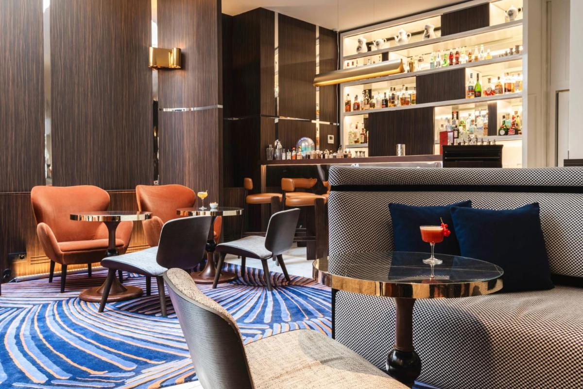 Coin salon dans l'établissement Hôtel Bel Ami