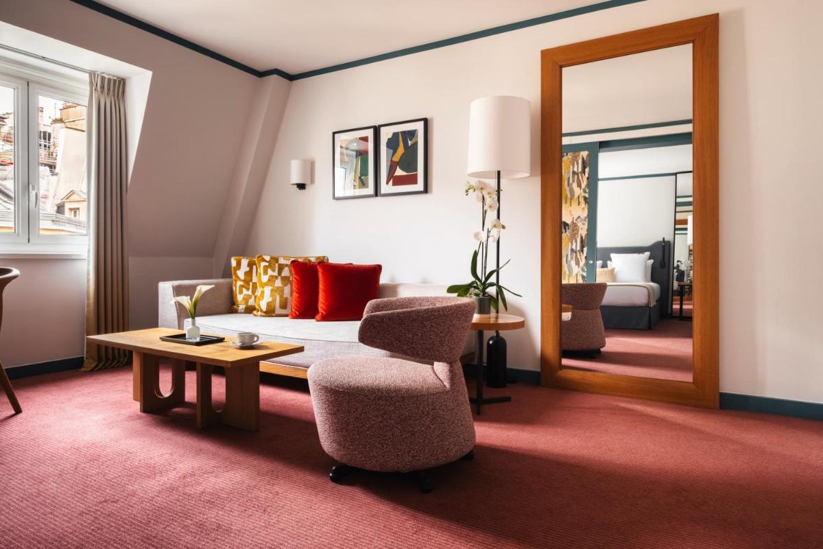 Coin salon dans l'établissement Hôtel Bel Ami