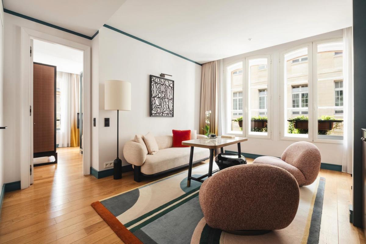 Coin salon dans l'établissement Hôtel Bel Ami