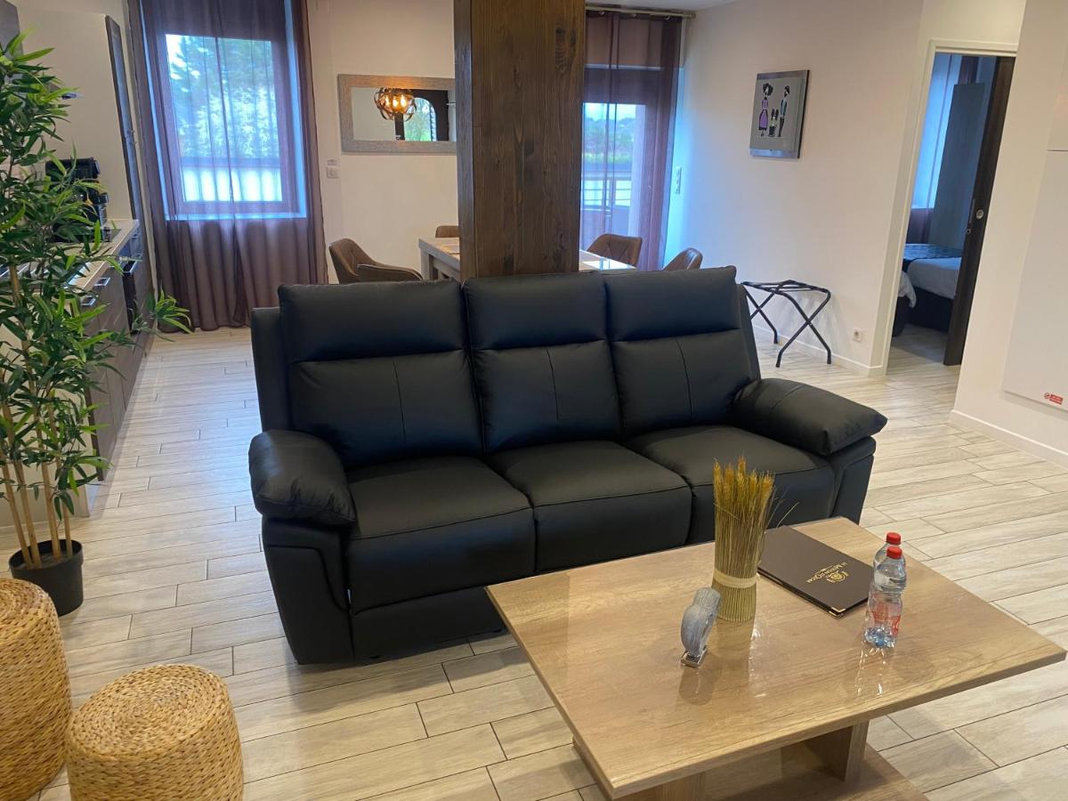 Coin salon dans l'établissement Le Moulin d'Oscar & Spa - Mulhouse Nord