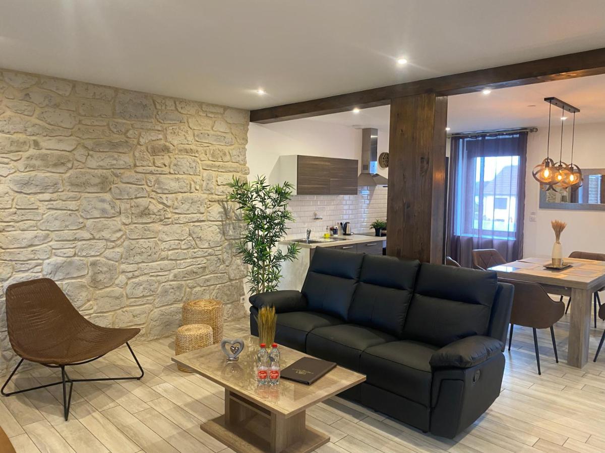 Coin salon dans l'établissement Le Moulin d'Oscar & Spa - Mulhouse Nord