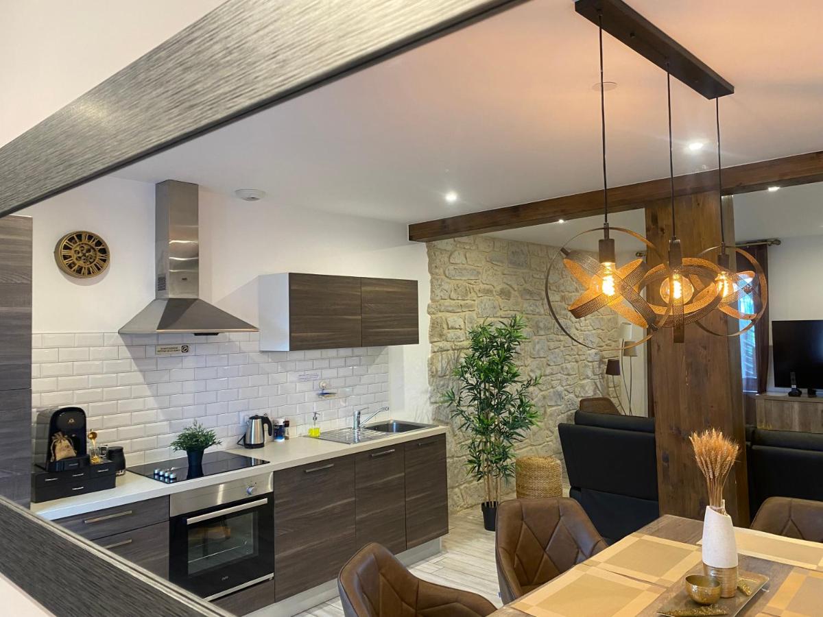 Cuisine ou kitchenette dans l'établissement Le Moulin d'Oscar & Spa - Mulhouse Nord