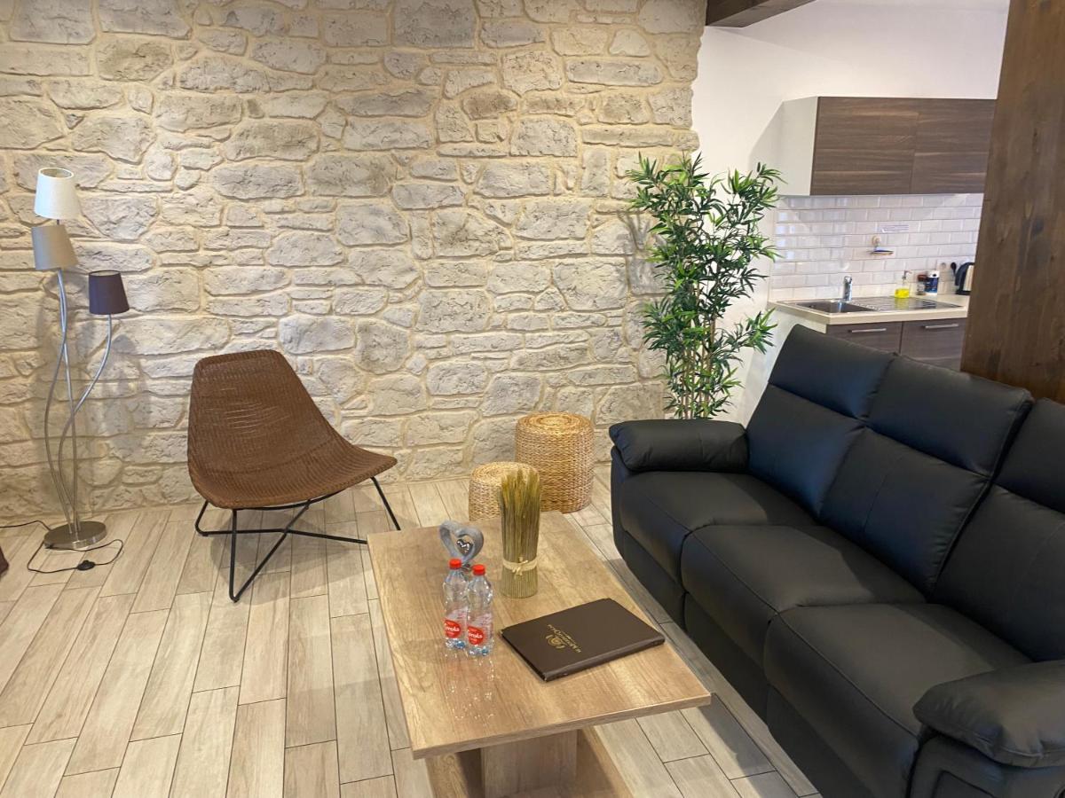 Coin salon dans l'établissement Le Moulin d'Oscar & Spa - Mulhouse Nord