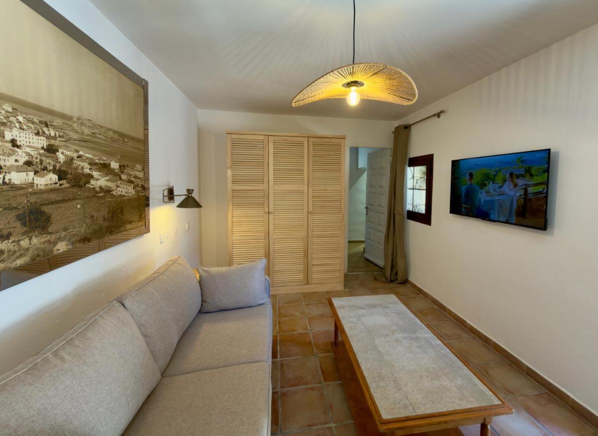 Coin salon dans l'établissement Hôtel Casa Rossa & Spa