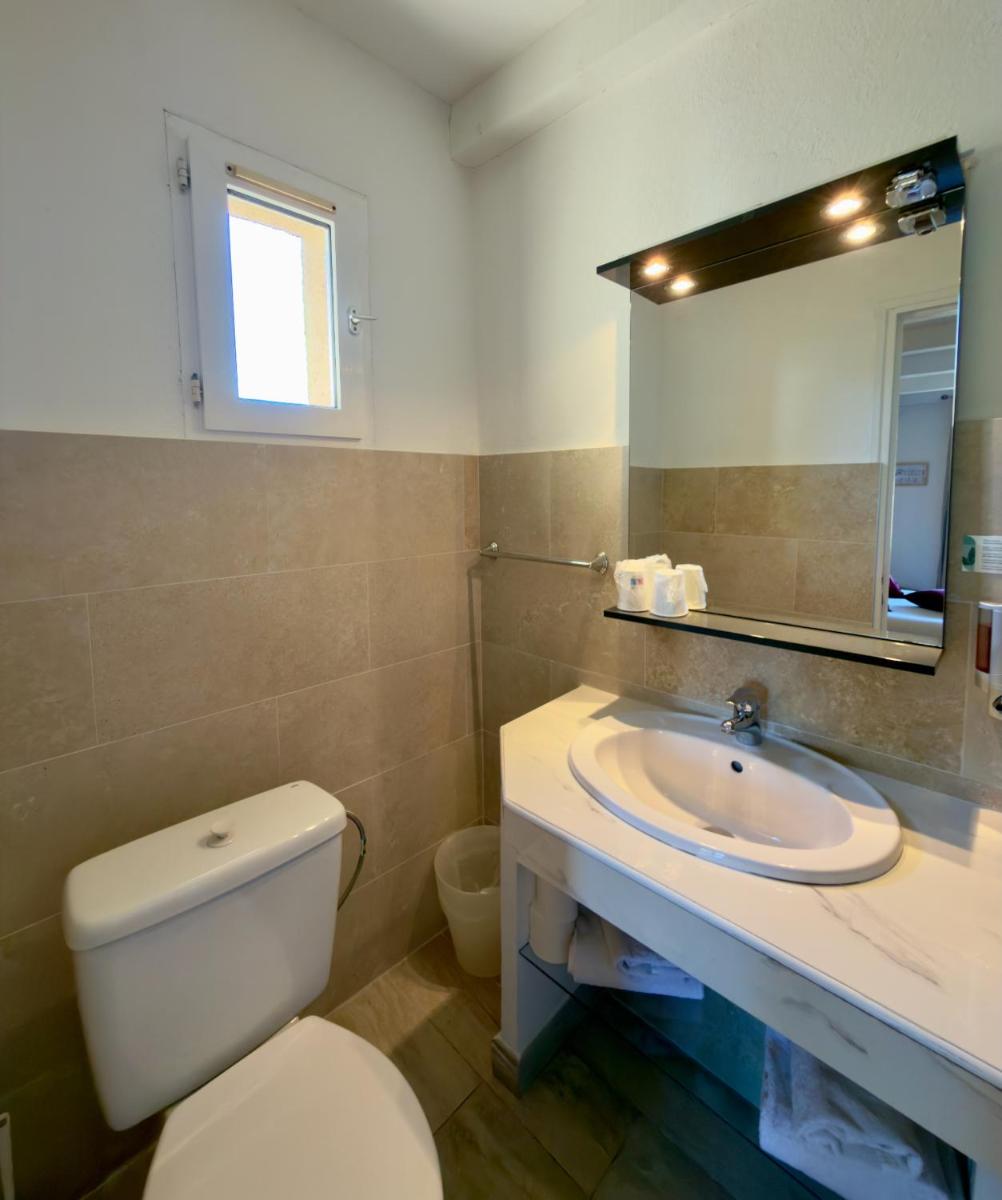 Salle de bains dans l'établissement Hôtel Casa Rossa & Spa