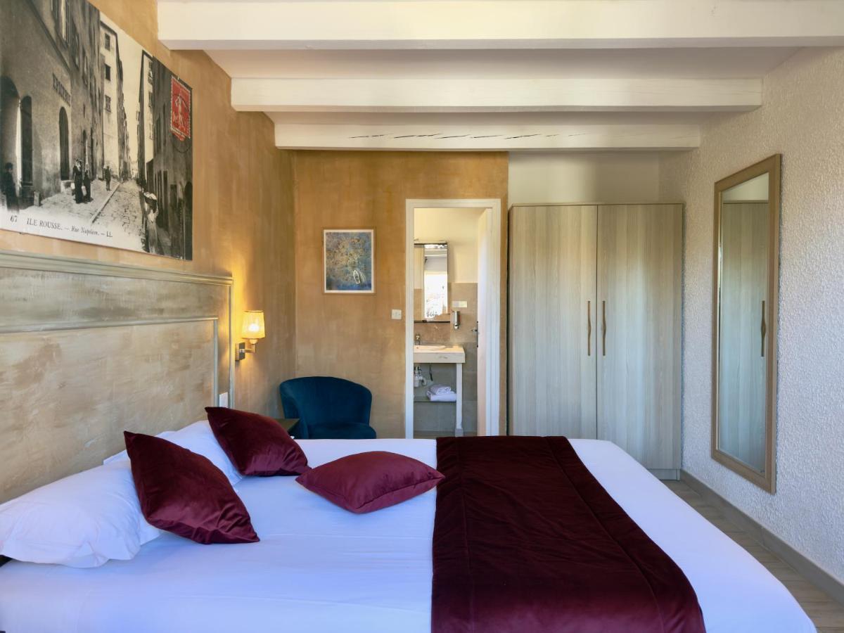 Un ou plusieurs lits dans un hébergement de l'établissement Hôtel Casa Rossa & Spa