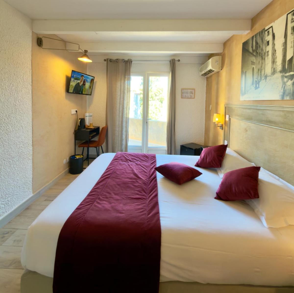 Un ou plusieurs lits dans un hébergement de l'établissement Hôtel Casa Rossa & Spa