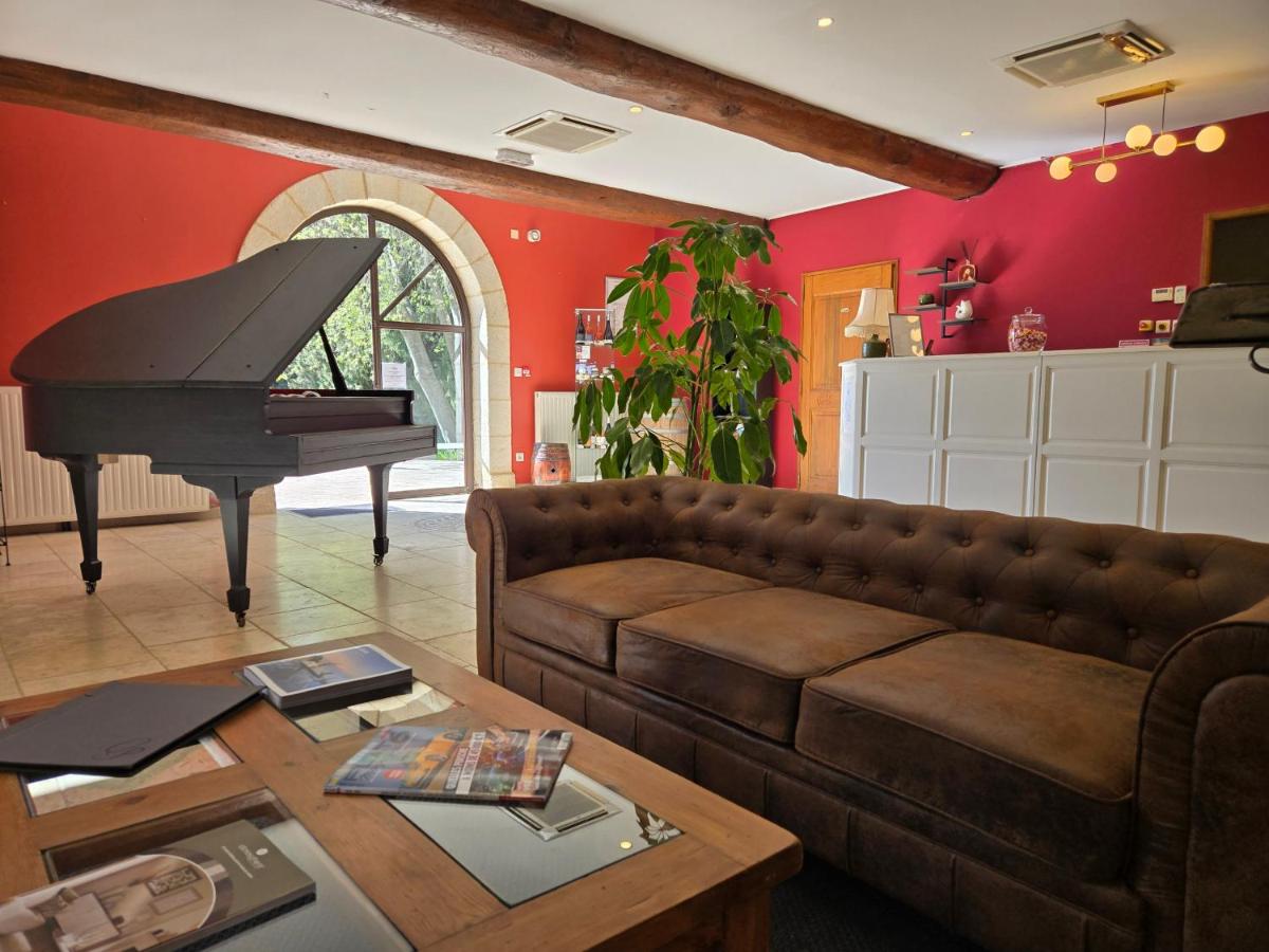 Coin salon dans l'établissement CÉRÈS - Boutique-Hôtel & Spa