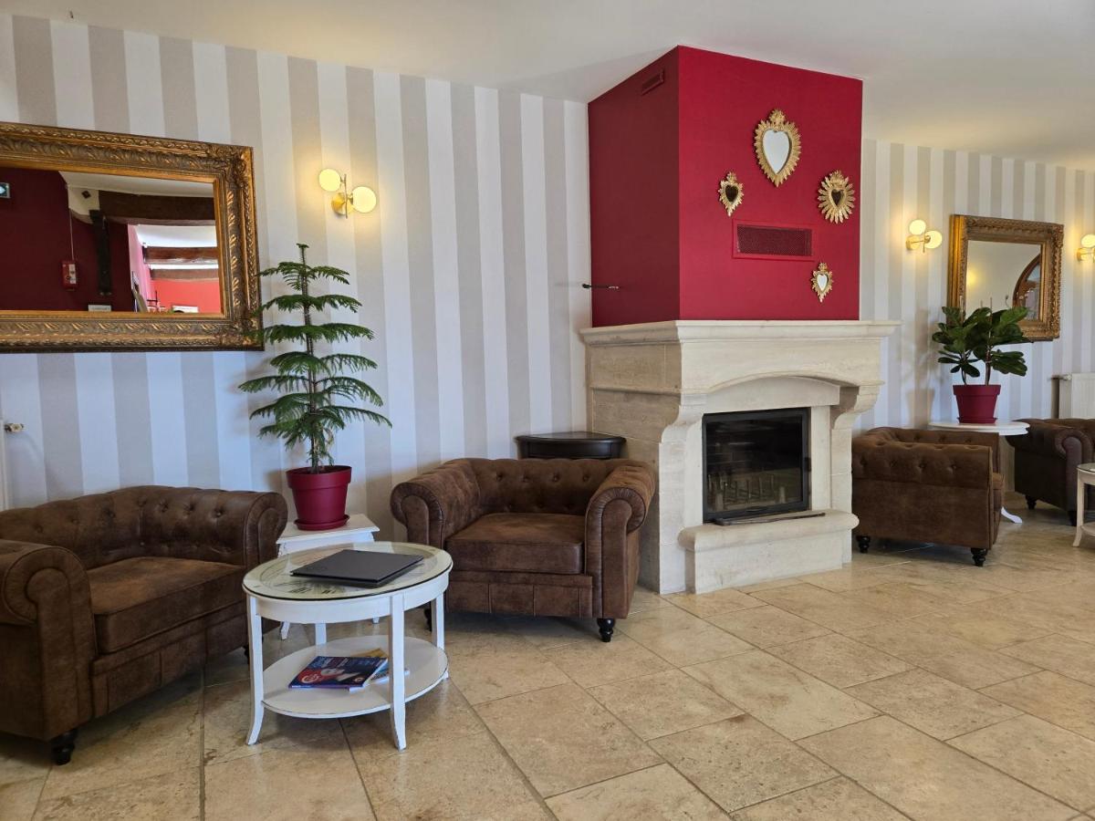 Coin salon dans l'établissement CÉRÈS - Boutique-Hôtel & Spa