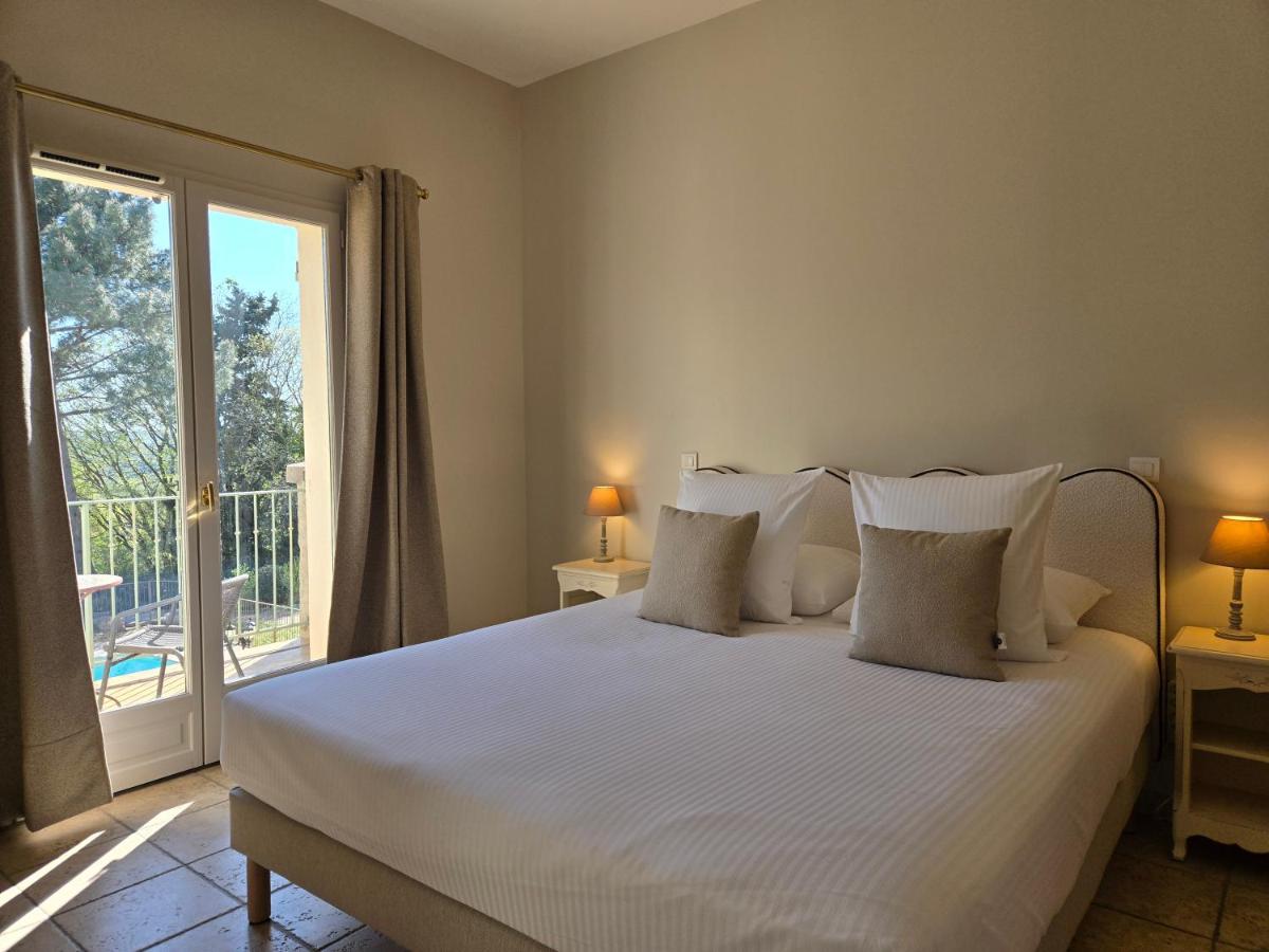 Un ou plusieurs lits dans un hébergement de l'établissement CÉRÈS - Boutique-Hôtel & Spa