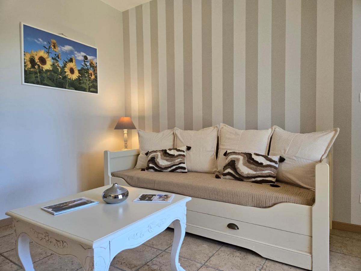 Coin salon dans l'établissement CÉRÈS - Boutique-Hôtel & Spa
