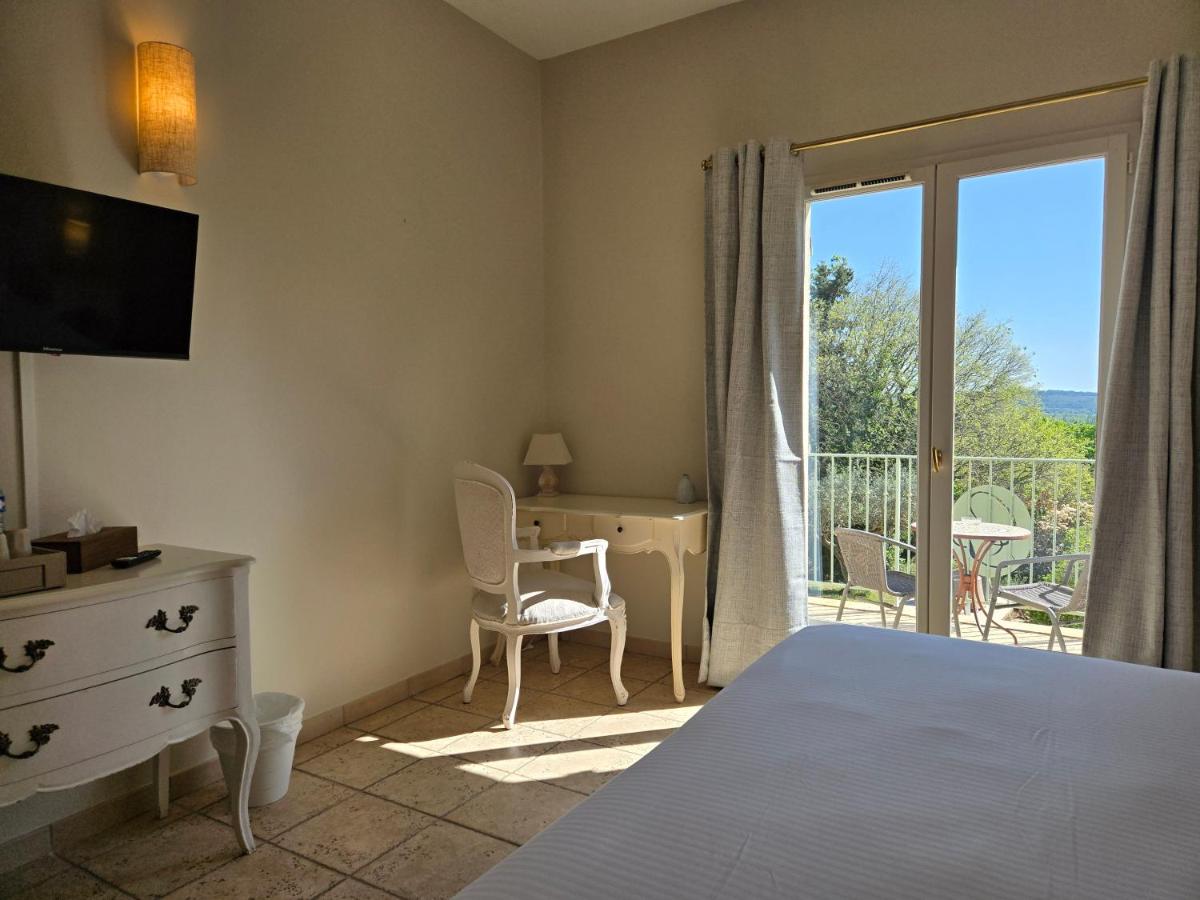 Un ou plusieurs lits dans un hébergement de l'établissement CÉRÈS - Boutique-Hôtel & Spa