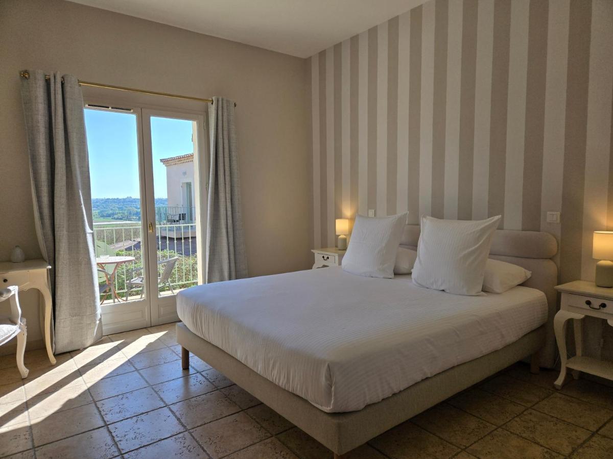 Un ou plusieurs lits dans un hébergement de l'établissement CÉRÈS - Boutique-Hôtel & Spa