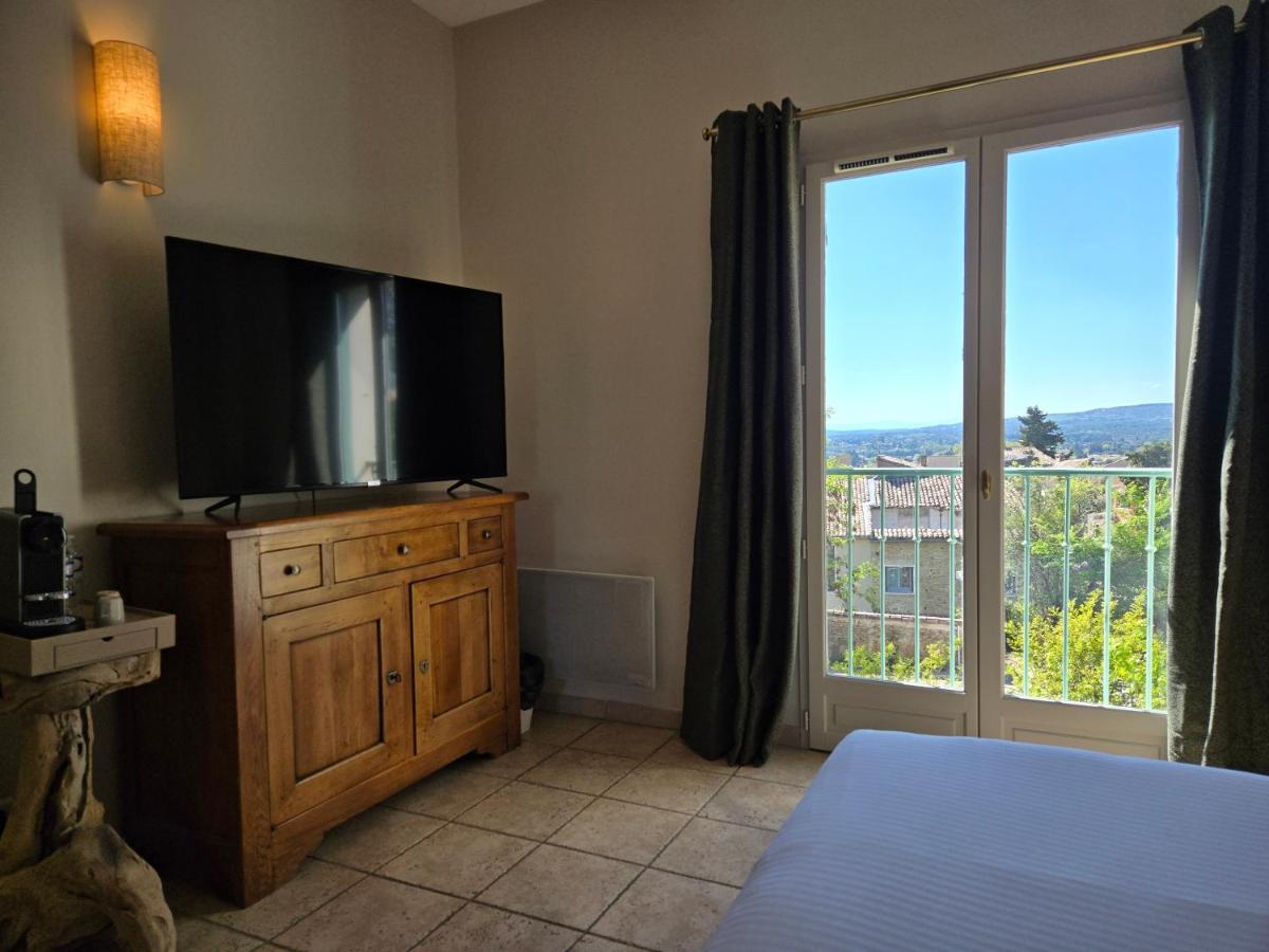 Télévision ou salle de divertissement dans l'établissement CÉRÈS - Boutique-Hôtel & Spa
