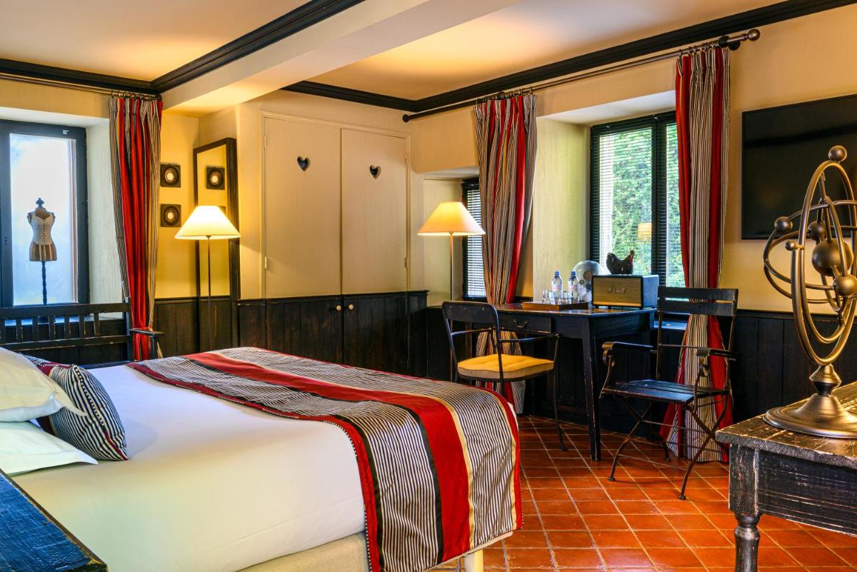 Un ou plusieurs lits dans un hébergement de l'établissement Château de Courban and Spa Nuxe