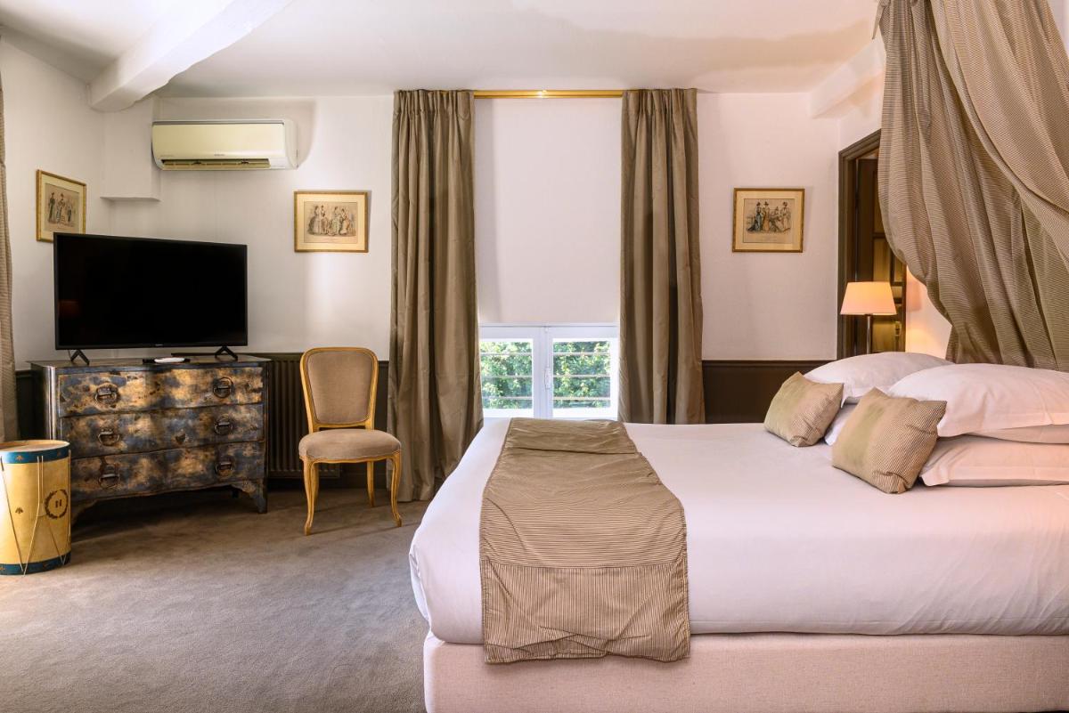 Un ou plusieurs lits dans un hébergement de l'établissement Château de Courban and Spa Nuxe