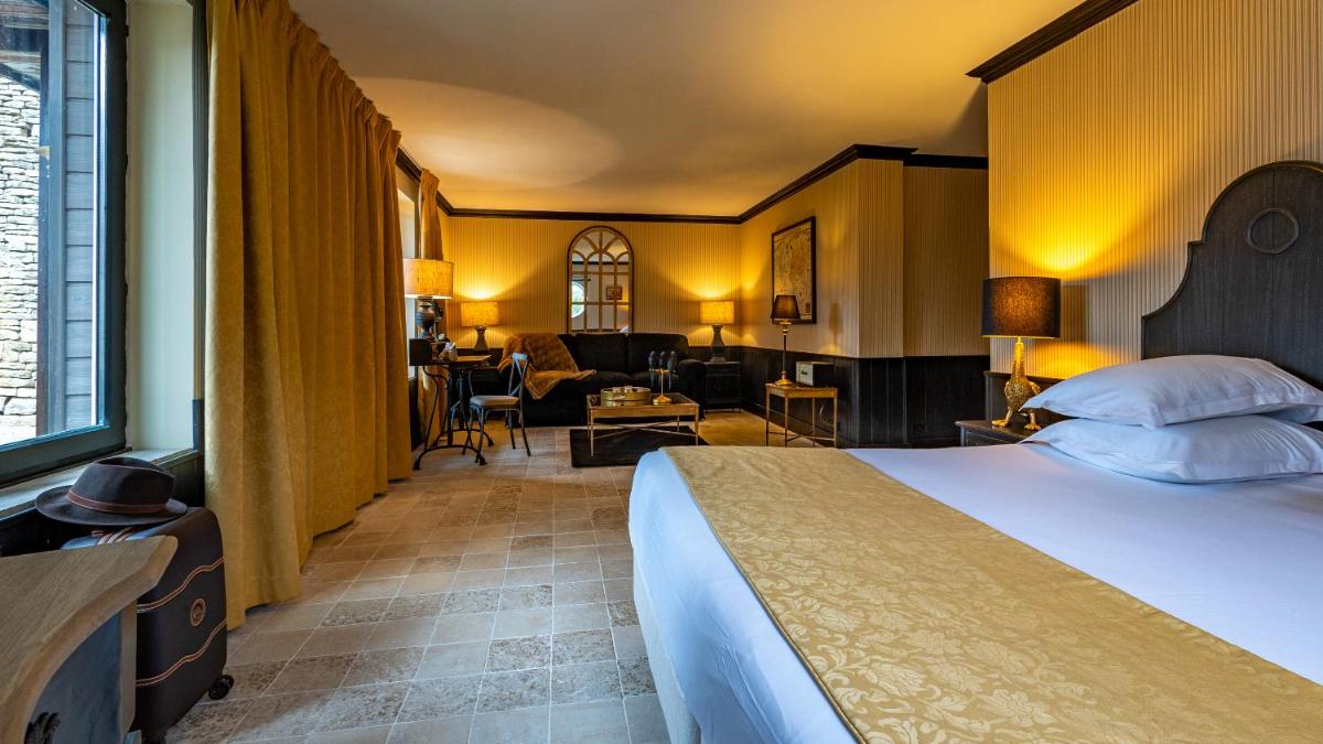 Un ou plusieurs lits dans un hébergement de l'établissement Château de Courban and Spa Nuxe