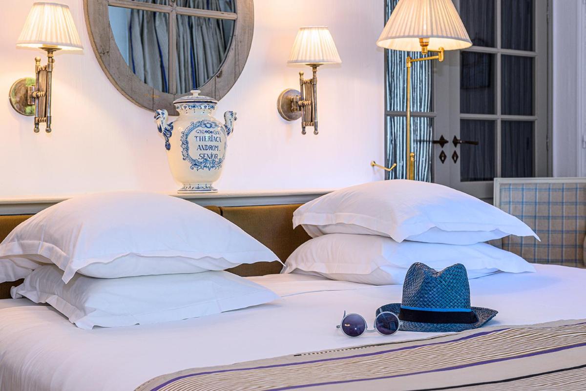 Un ou plusieurs lits dans un hébergement de l'établissement Château de Courban and Spa Nuxe