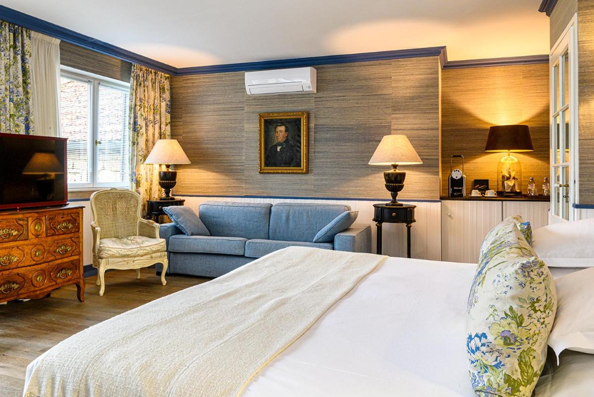 Un ou plusieurs lits dans un hébergement de l'établissement Château de Courban and Spa Nuxe