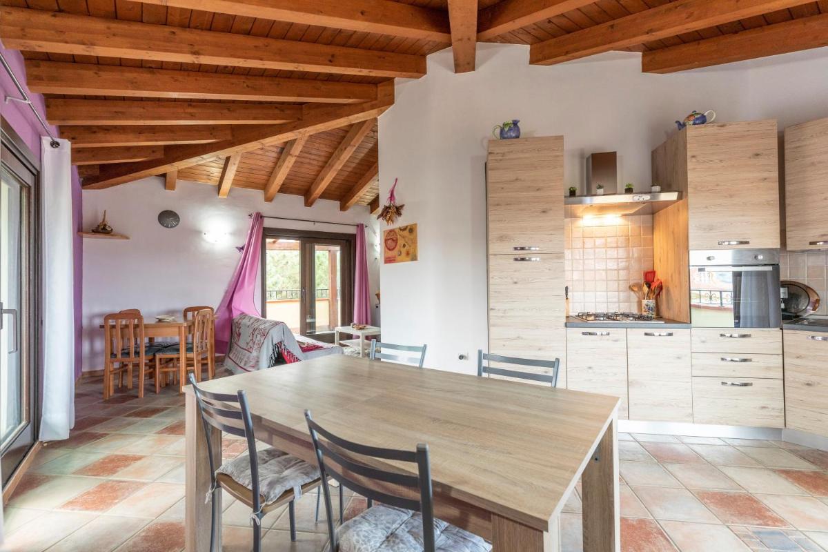 Attico con vista collinare - Housity