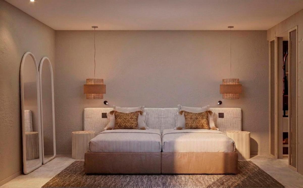 Uma cama ou camas num quarto em The Lince Ecorkhotel Évora