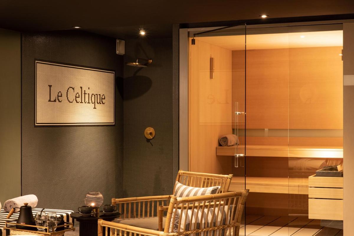 Cuisine ou kitchenette dans l'établissement Le Celtique & Spa