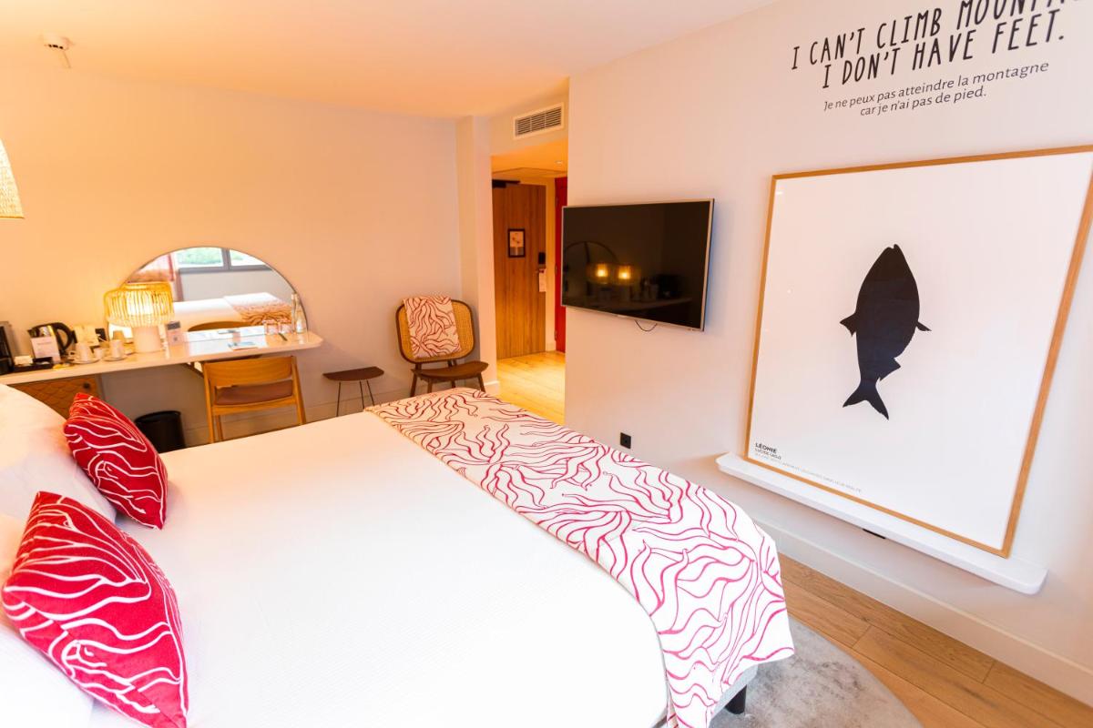Un ou plusieurs lits dans un hébergement de l'établissement Black Bass Hotel