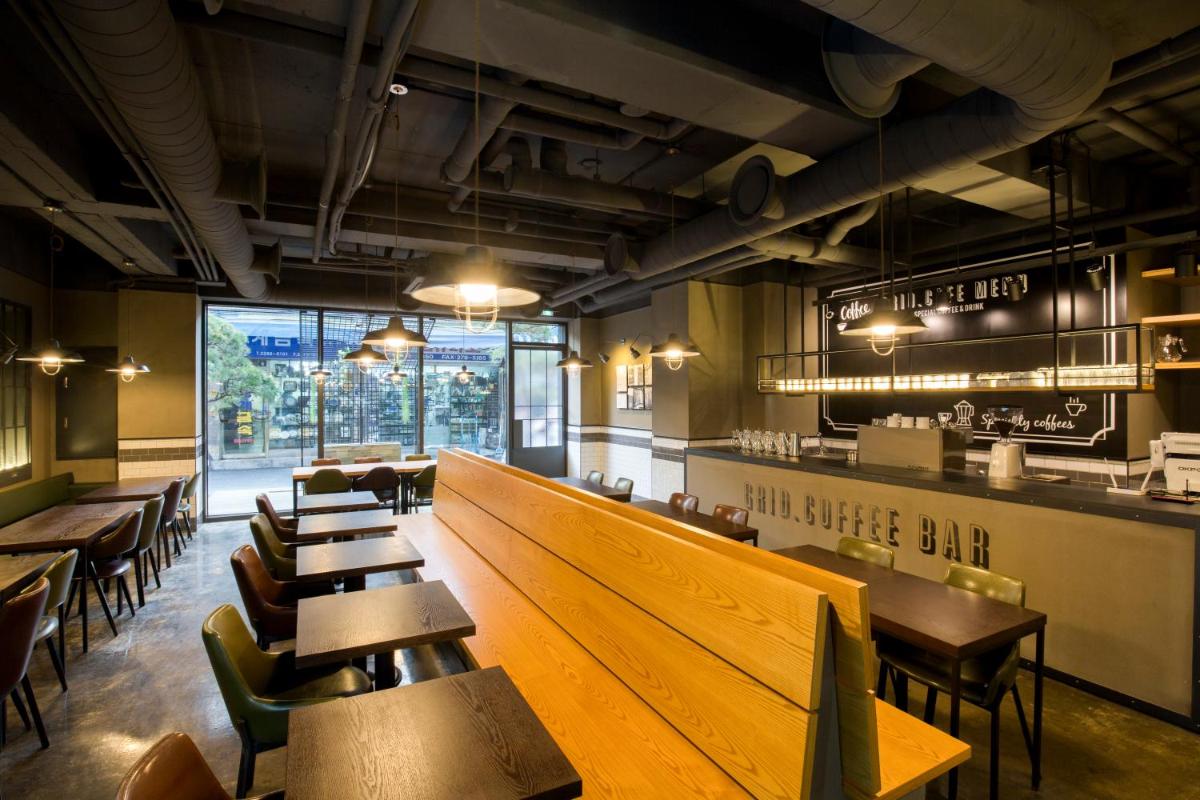 Grid Inn Hotel - Housity