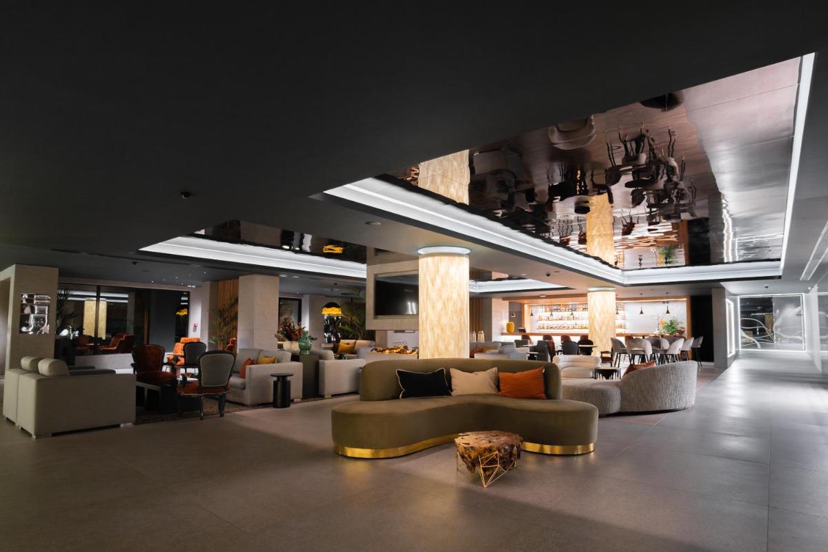 Uma área de estar em Alambique - Hotel Resort & Spa