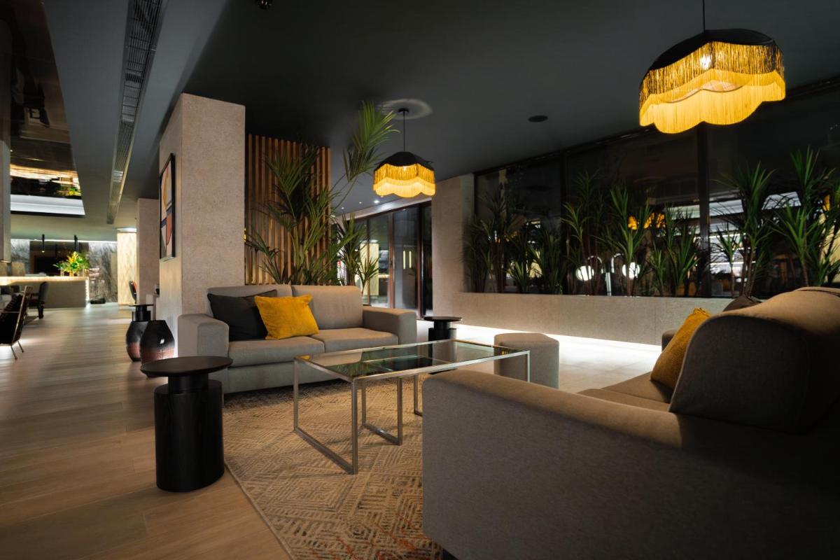 Uma área de estar em Alambique - Hotel Resort & Spa