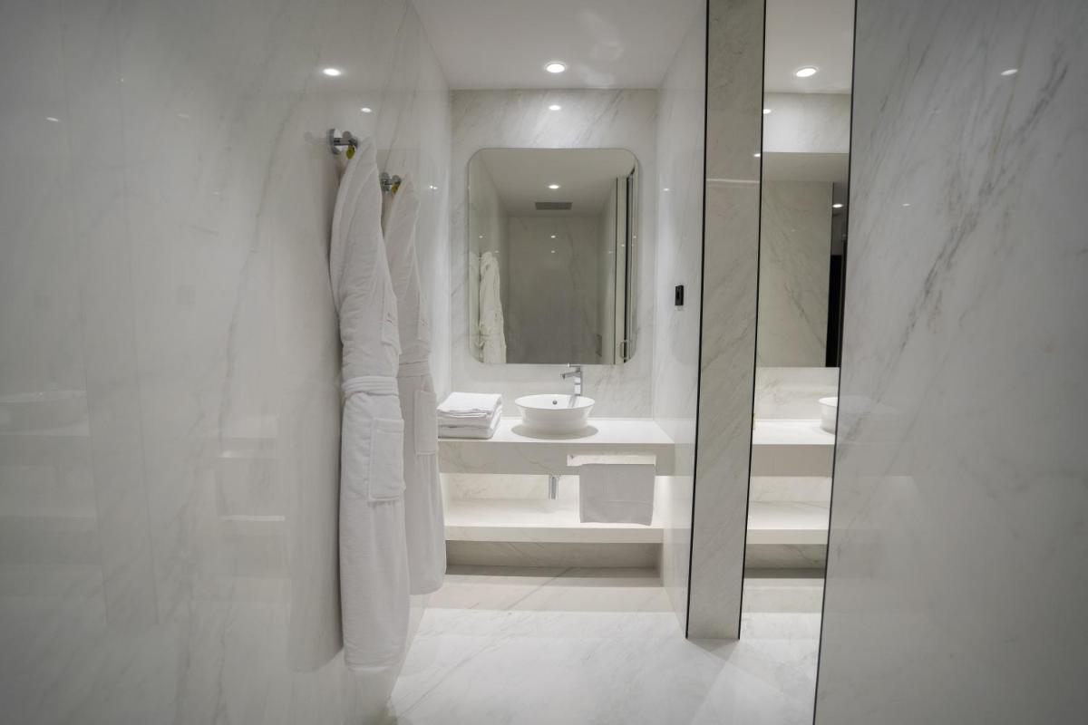 Uma casa de banho em Alambique - Hotel Resort & Spa