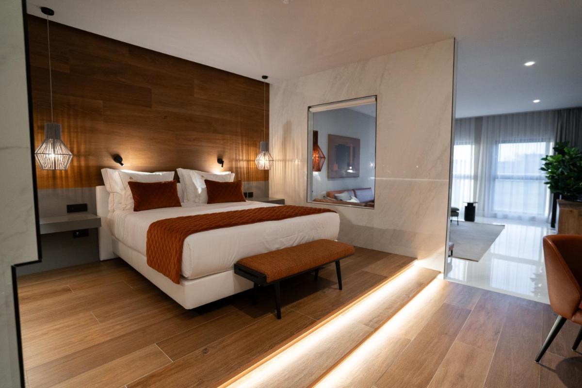 Uma cama ou camas num quarto em Alambique - Hotel Resort & Spa