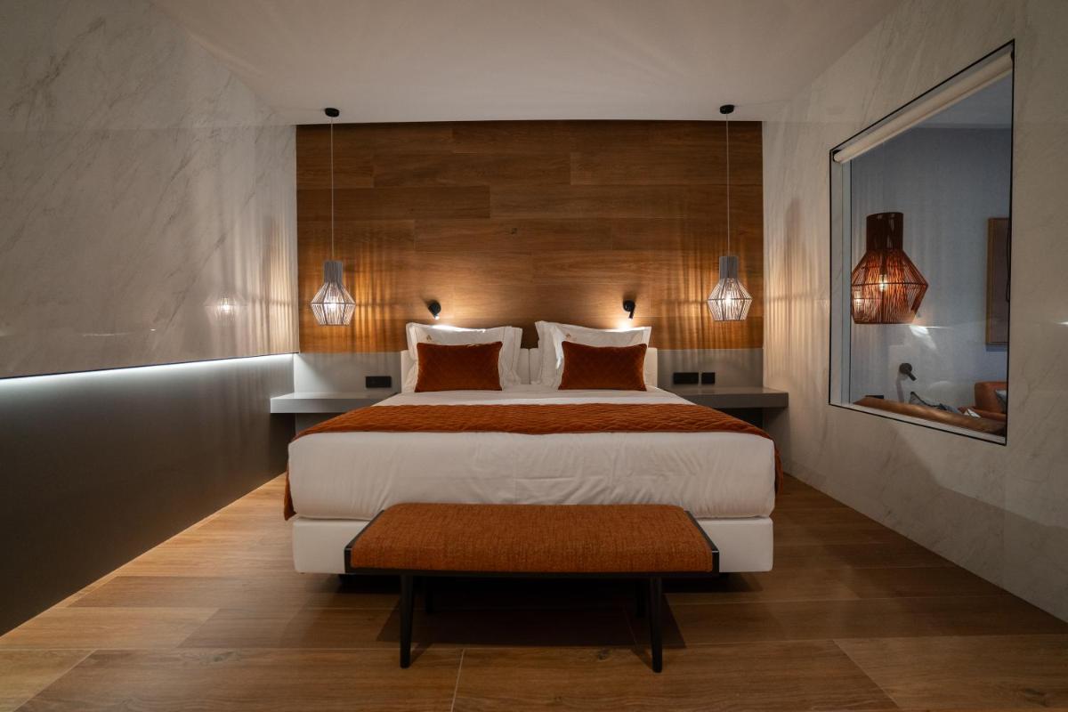 Uma cama ou camas num quarto em Alambique - Hotel Resort & Spa