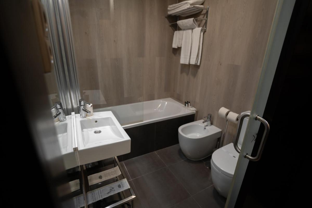 Uma casa de banho em Alambique - Hotel Resort & Spa