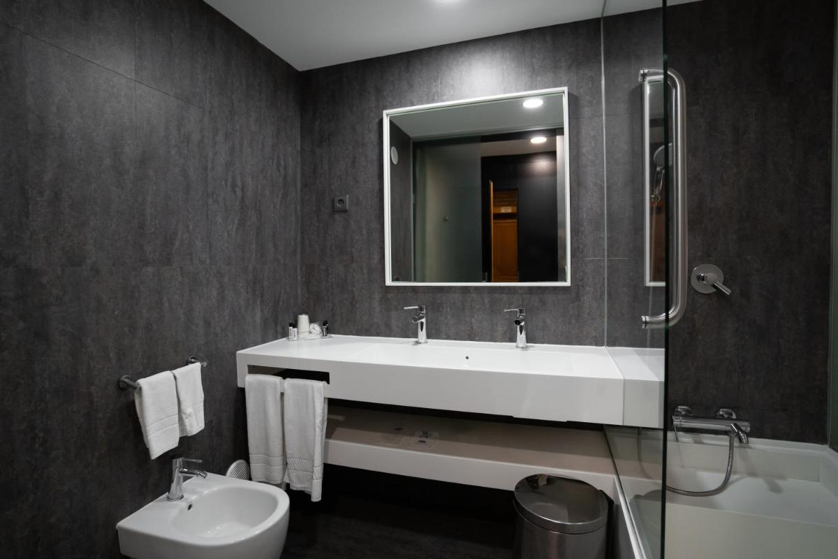 Uma casa de banho em Alambique - Hotel Resort & Spa