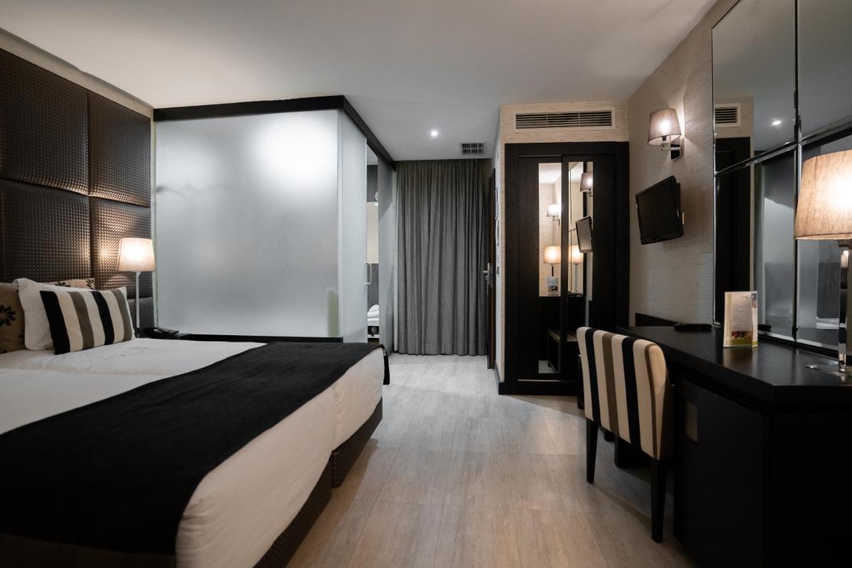 Uma cama ou camas num quarto em Alambique - Hotel Resort & Spa