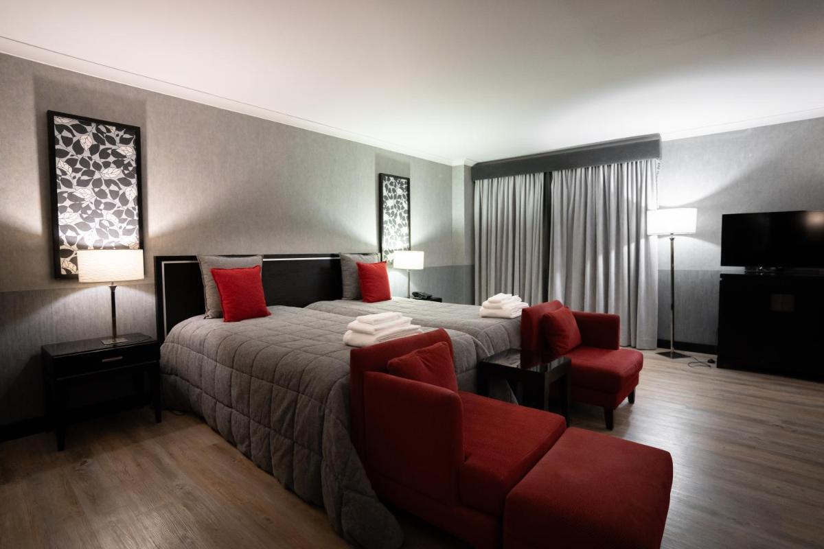 Uma cama ou camas num quarto em Alambique - Hotel Resort & Spa