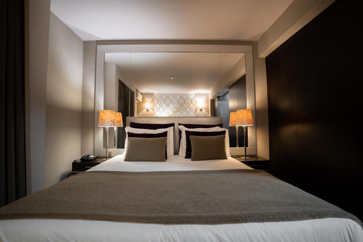 Uma cama ou camas num quarto em Alambique - Hotel Resort & Spa