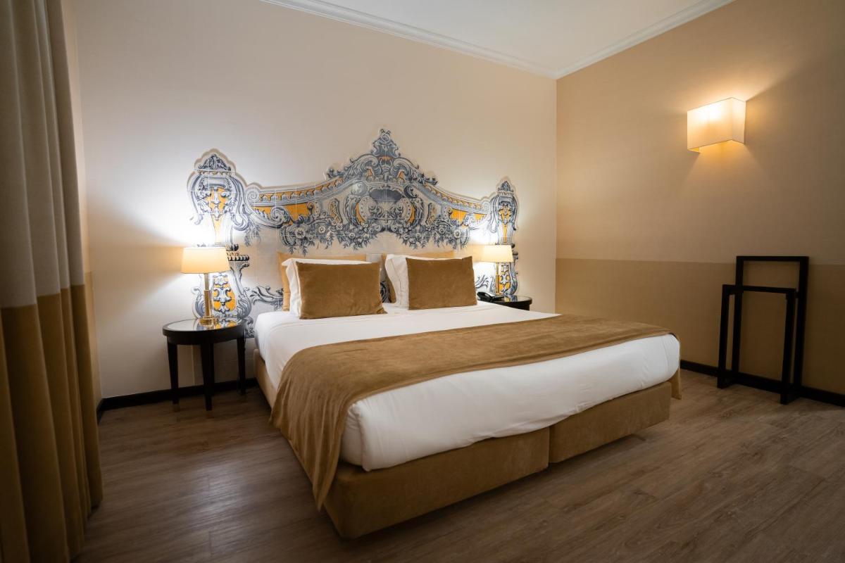 Uma cama ou camas num quarto em Alambique - Hotel Resort & Spa
