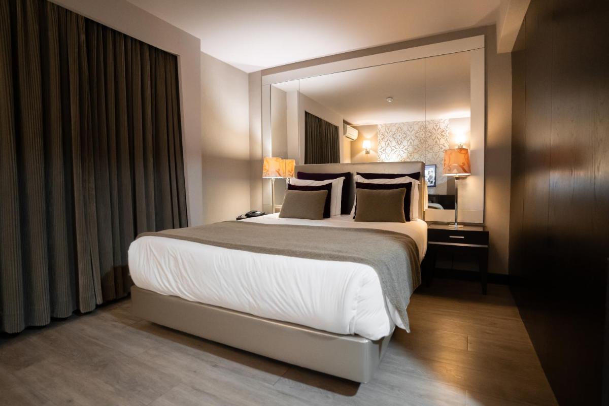 Uma cama ou camas num quarto em Alambique - Hotel Resort & Spa