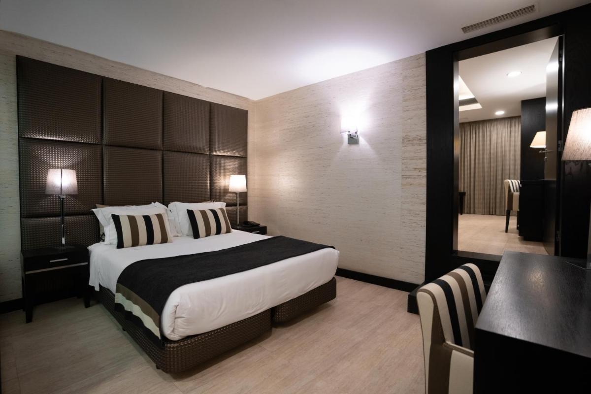 Uma cama ou camas num quarto em Alambique - Hotel Resort & Spa