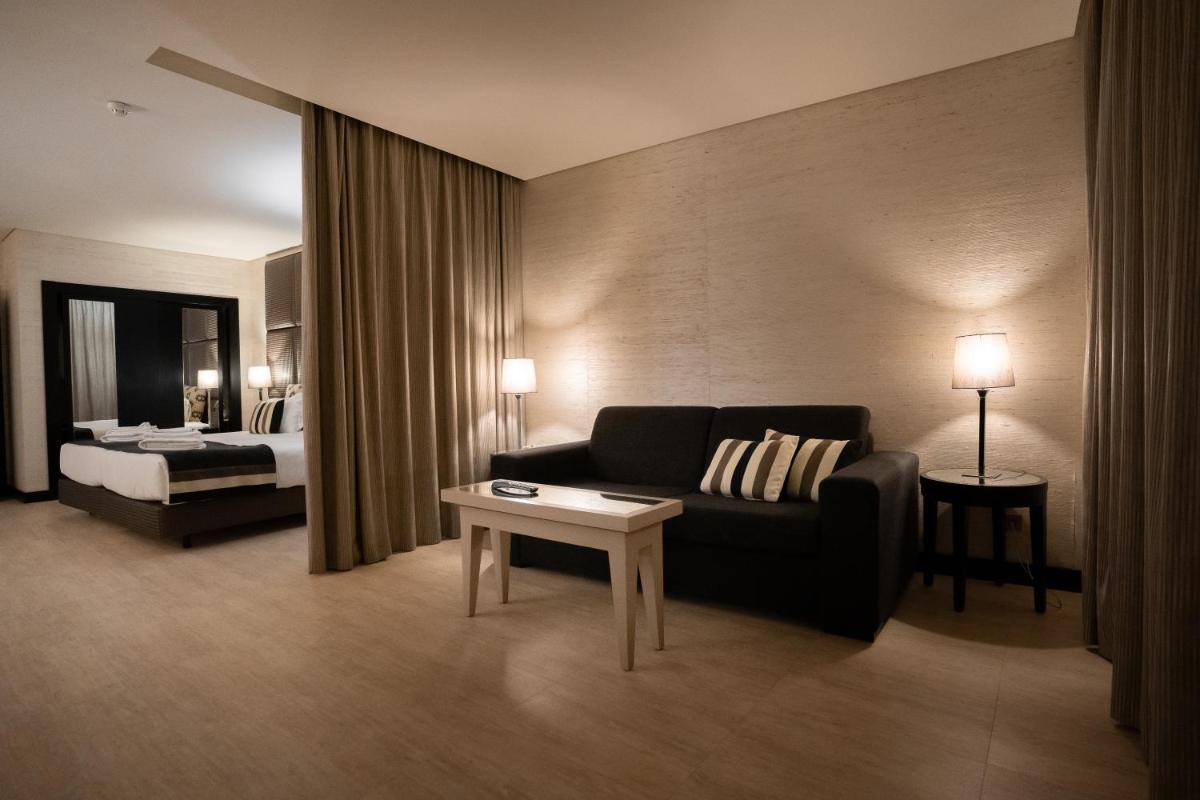 Uma cama ou camas num quarto em Alambique - Hotel Resort & Spa
