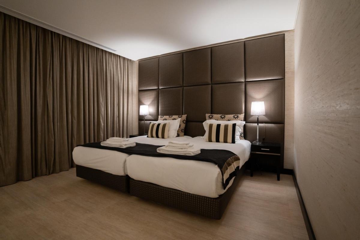 Uma cama ou camas num quarto em Alambique - Hotel Resort & Spa