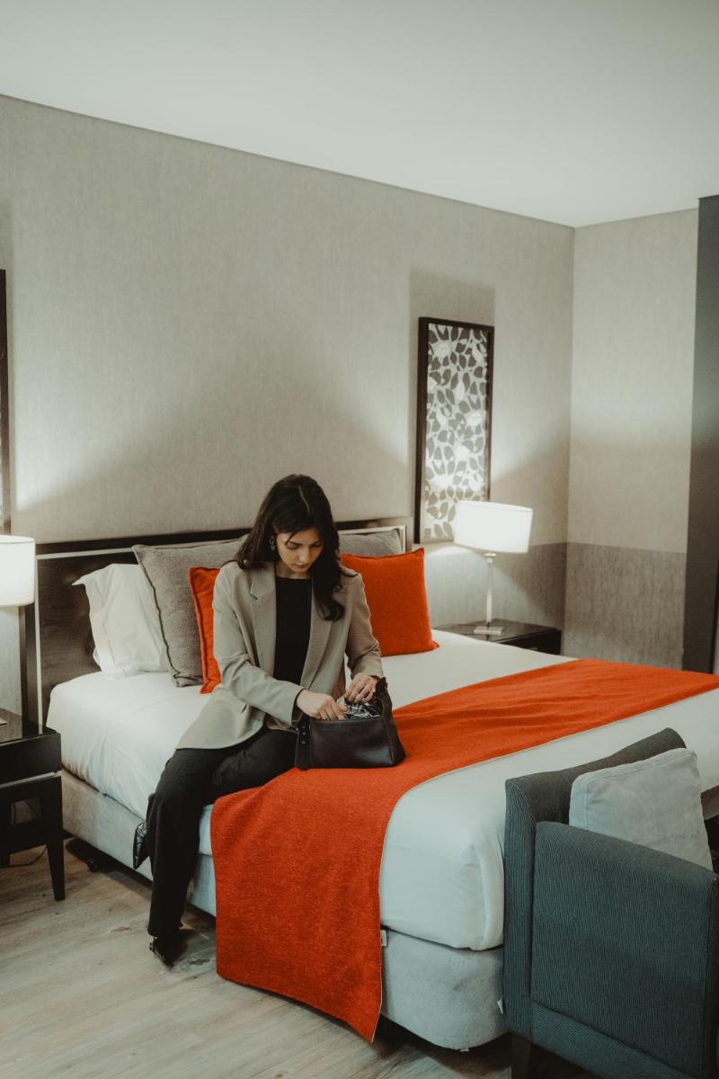 Uma cama ou camas num quarto em Alambique - Hotel Resort & Spa