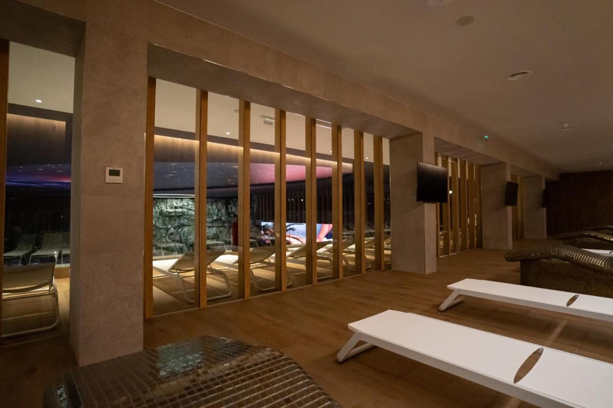 Uma cama ou camas num quarto em Alambique - Hotel Resort & Spa