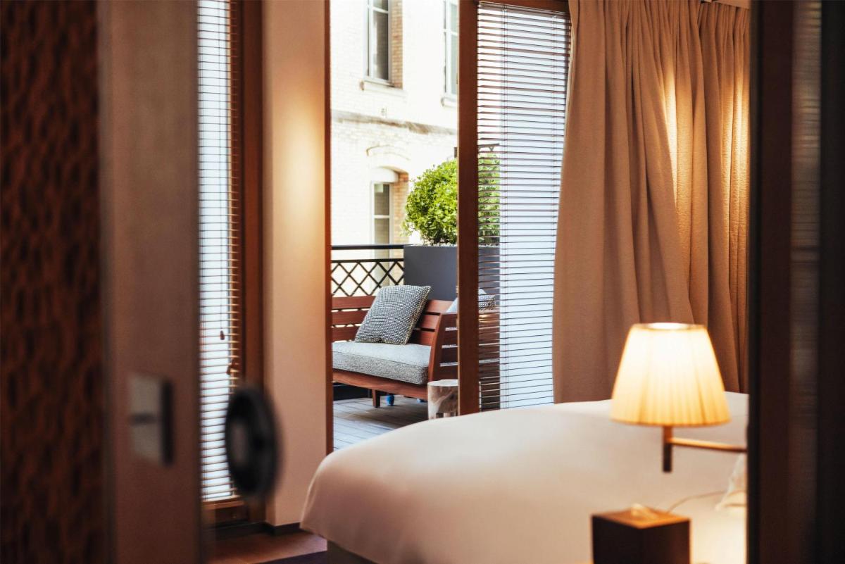 Un ou plusieurs lits dans un hébergement de l'établissement Hotel SAX Paris, LXR Hotels & Resorts